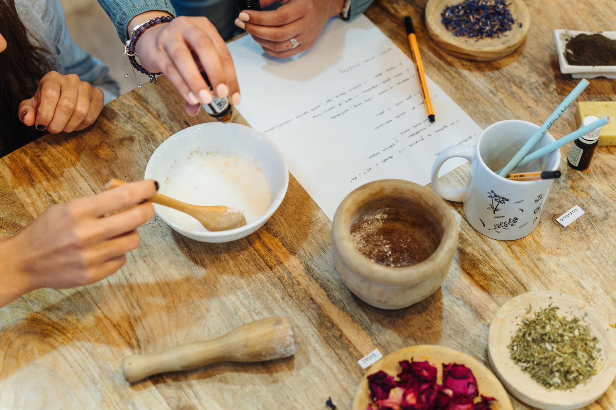 consultation notes and tasting spoons on table