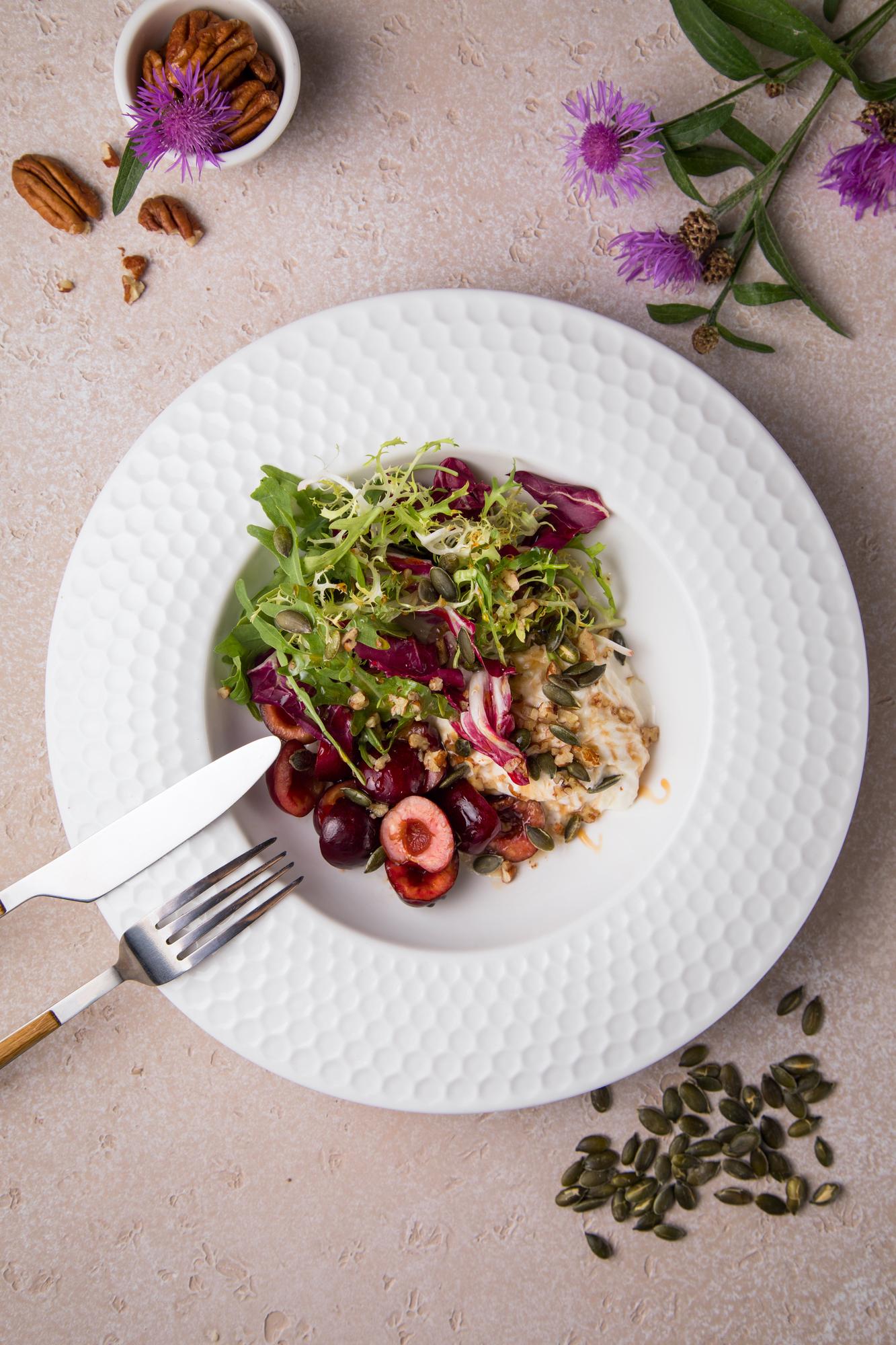 plated seasonal salad with herbs