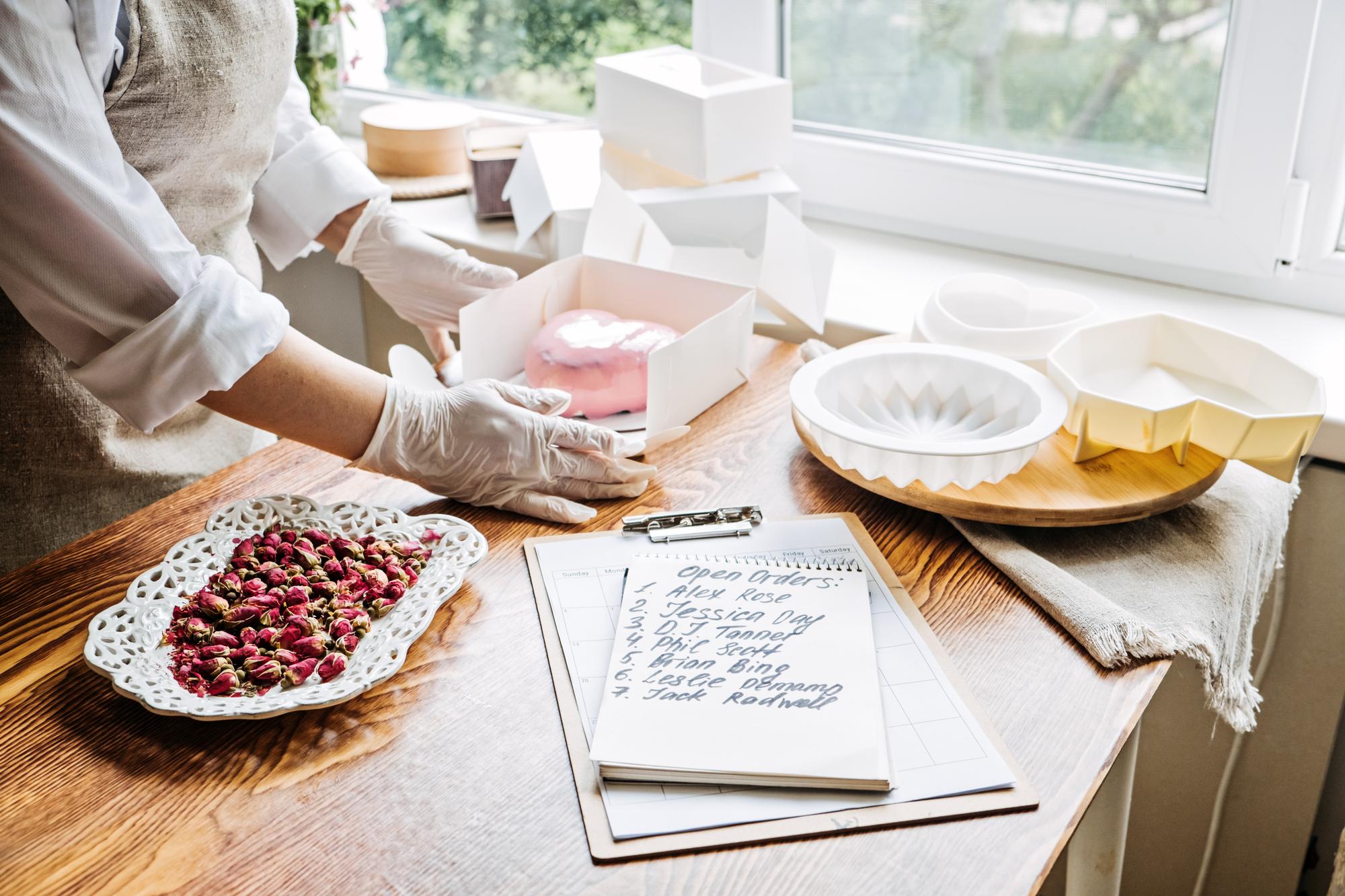 workshop station with annotated recipe sheets